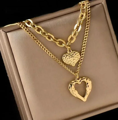 New Two-Heart Gold Necklace with Uneven Folds