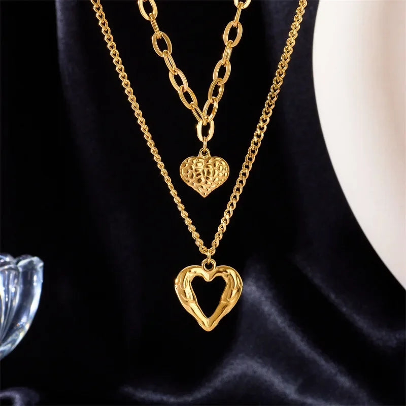 New Two-Heart Gold Necklace with Uneven Folds