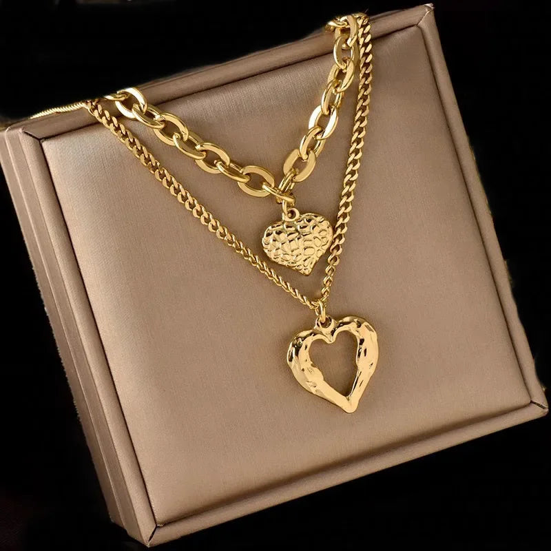 New Two-Heart Gold Necklace with Uneven Folds