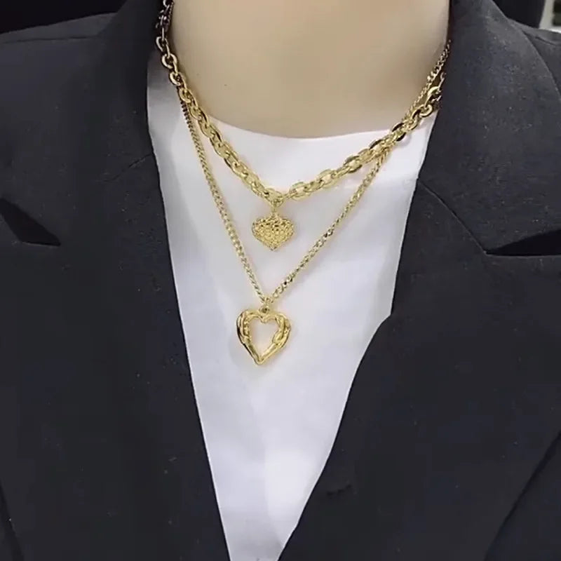 New Two-Heart Gold Necklace with Uneven Folds